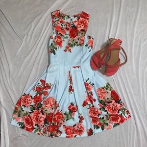 Beautiful blue dress with pink flowers.